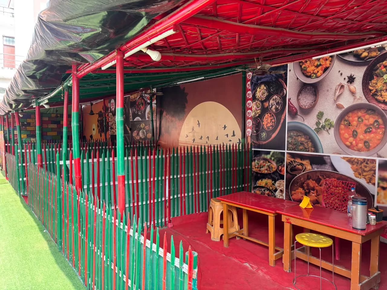 Booth with sunset mural